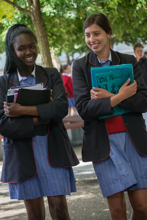 secondary girls walking to school