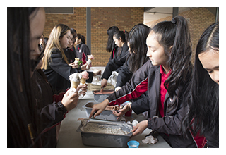 Students sell ice cream raising money for asylum seekers