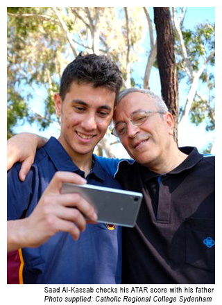 Saad Al-Kassab the dux of Catholic Regional College Sydenham receives his ATAR score with his father