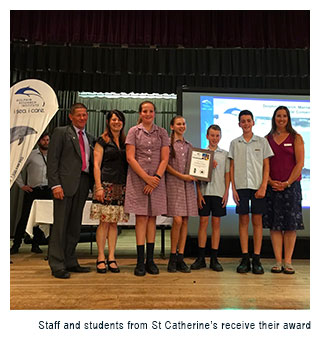 Staff and students from St Catherine's receive their award