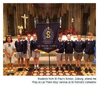 Students from St Paul's School, Coburg, attend the 'Pray to Let Them Stay' service at St Patrick's Cathedral
