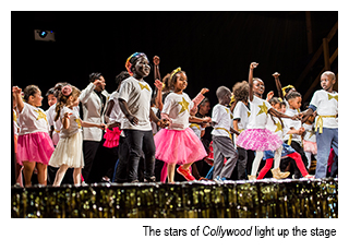 Students dancing onstage at Collywood performance.