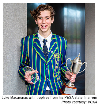 Luke Macaronas, St Kevin's College student, with his trophies for winning the Plain English Speaking Awards