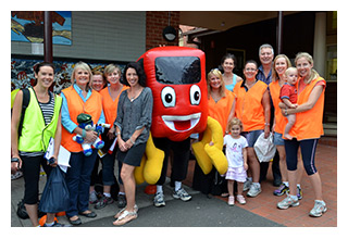 Volunteers with the walking to school mascot