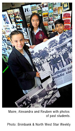 Maire, Alexandra and Reuben with photos of past students.  Photo: Brimbank & North West Star Weekly