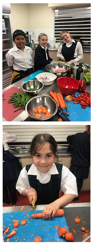 Students from St Luke’s School, Wantirna preparing meals for vulnerable families.