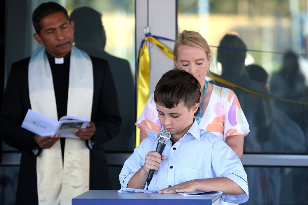 student reading at Mary Queen of Heaven