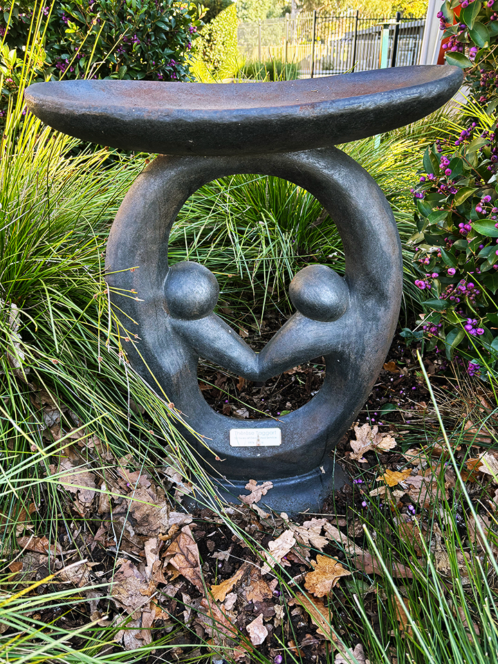 Bird bath sculpture commemorating Therese’s decades of service