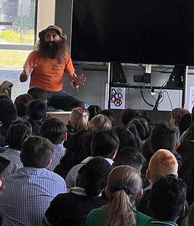 Costa Georgiadis talking to students